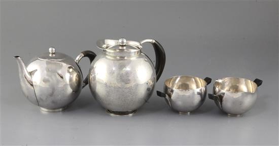A 1930s Johan Rohde for Georg Jensen four-piece planished sterling silver horn-handled tea service, design no. 533A/B, gross 44.5